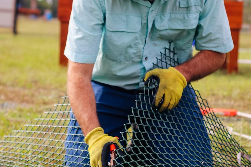 cutting the fence wire